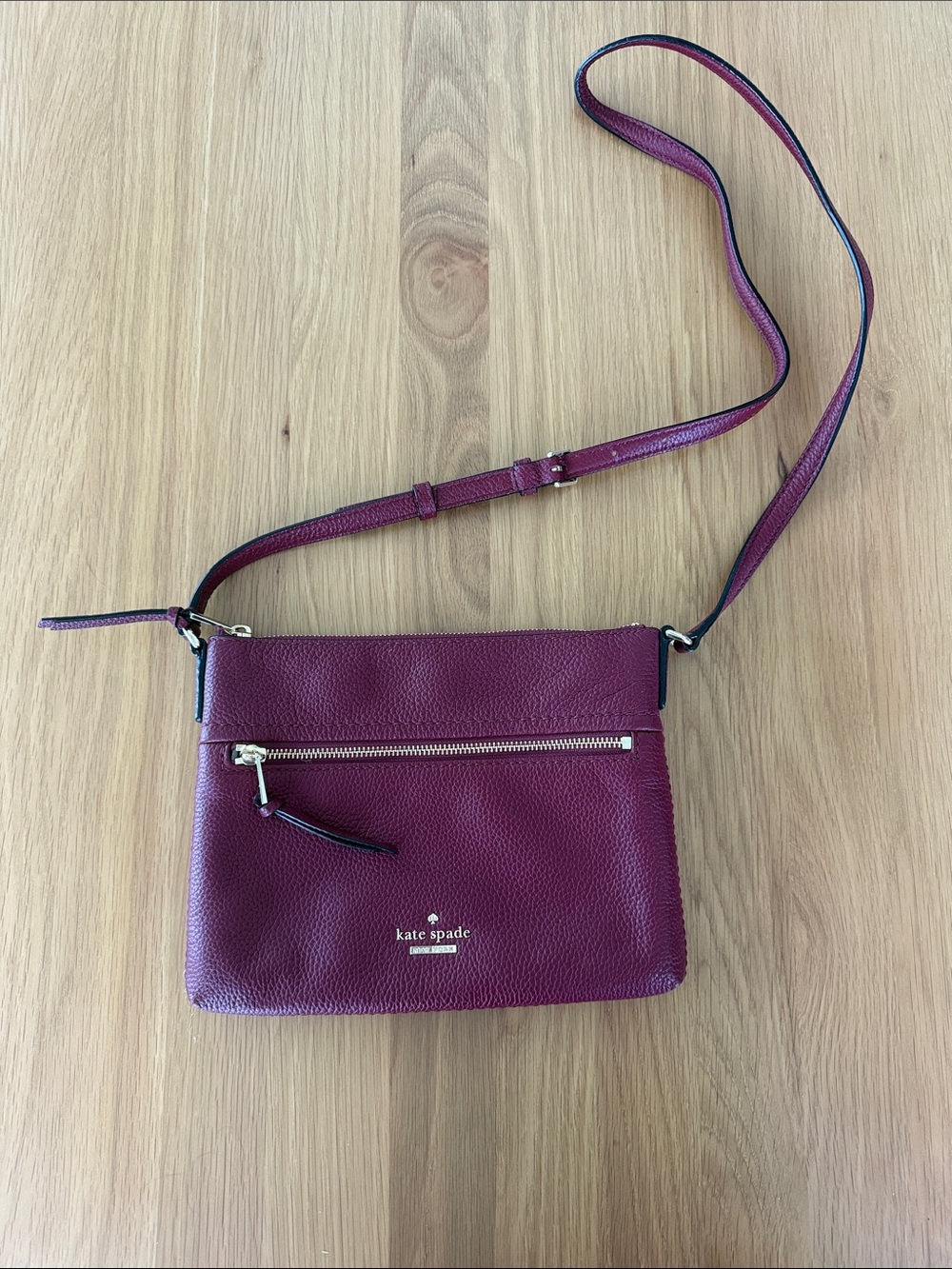 Kate Spade burgundy cross body, lovingly used, good condition